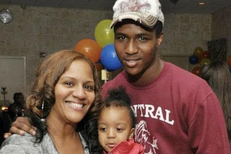 Brandon Dixon, right, with his mother and daughter.