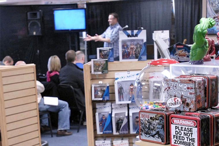 Pointe Church Pastor Tony Cecil delivers his sermon on Nov. 24, 2013, at the A+ Comic shop which transforms into a church and back into a store each Sunday. (Mark Ashley/Lexington Herald-Leader/MCT)