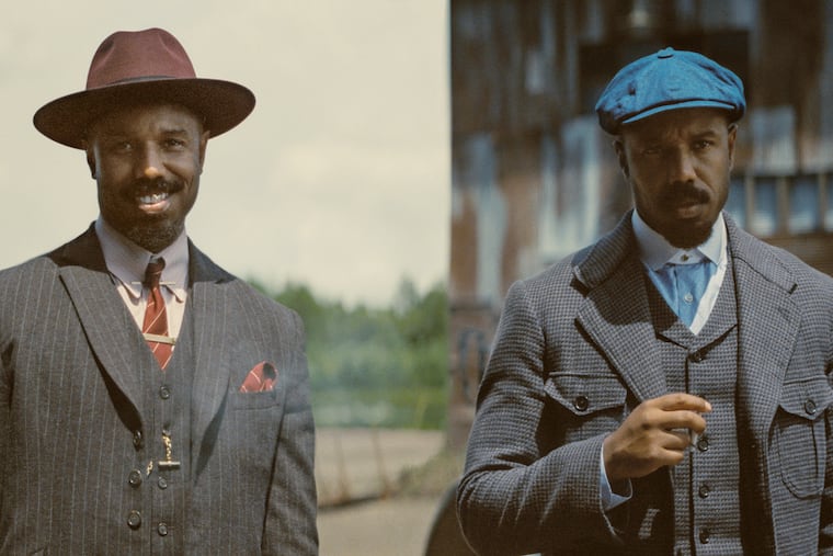 This image released by Warner Bros Pictures shows Michael B. Jordan portraying two characters in a scene from "Sinners." (Warner Bros. Pictures via AP)