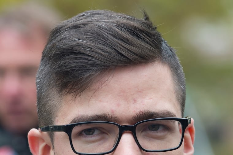 File--- In this picture taken Nov.5, 2016 Martin Sellner, leader of the right-wing populist Identitarian movement of Austria is seen giving an interview in Berlin, Germany. (Paul Zinken/dpa via AP)