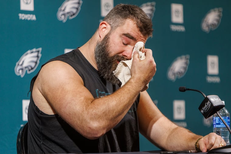 Philadelphia Eagle Jason Kelce wipes tears as he announces his retirement, at the NovaCare Complex in Philadelphia on Monday, March 4, 2024.