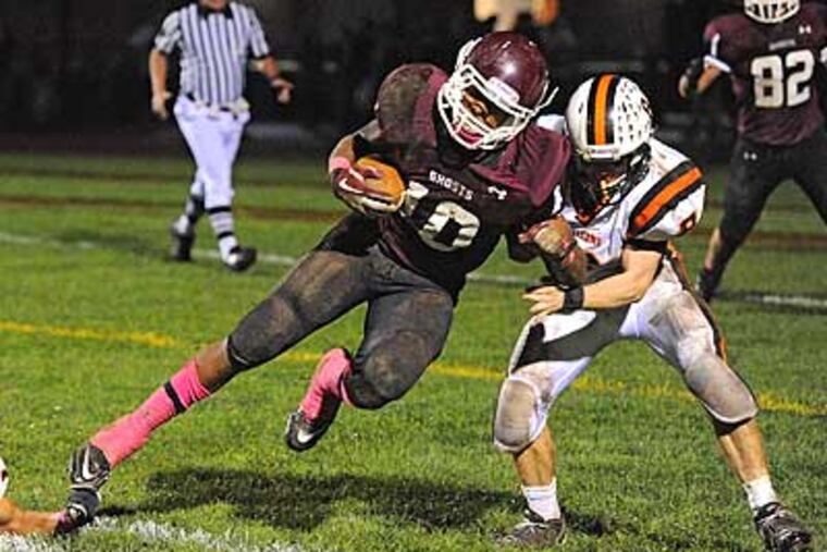Abington's Myles Grasty pushes past Pennsbury's Adam Lewis. (Clem Murray/Staff Photographer)