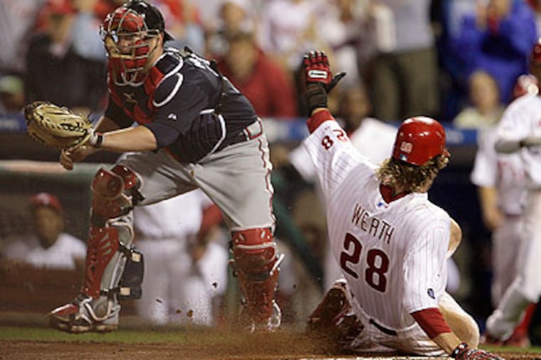 Jayson Werth beat the throw home to score the only run of the game in the eighth inning. (Yong Kim/Staff Photograher)