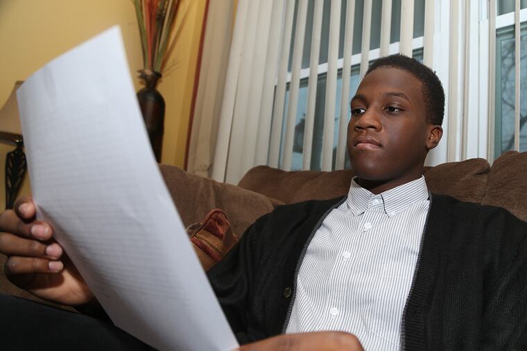 Michael DeShield, 15, with his letter to Trayvon Martin. (ANDREW THAYER / STAFF PHOTOGRAPHER)