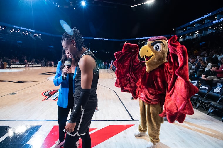 The St. Joseph's Hawk always finds the spotlight — and keeps on flapping — even after Erik Reynolds' big game against Richmond during the Atlantic 10 tournament.