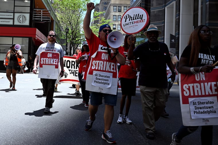 Employees at the downtown Sheraton Hotel represented by UNITE HERE Local 274, marched through Center City Wednesday.