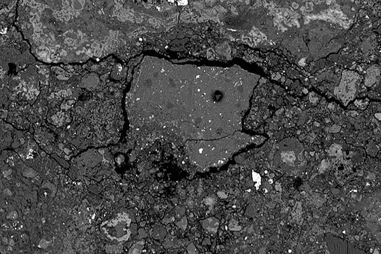 A photo provided by the SETI Institute shows a bit of the Hillsborough, N.J., meteorite, a specific kind of space rock called a CM chondrite that contained unique fragments rich in water and sodium.