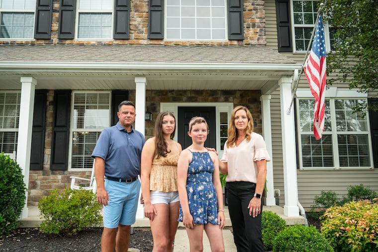 The Monahan Family, of Montgomery County, has a fighting spirit: (from left to right) Dad Ryan Monahan, 17-year-old Madison, 14-year-old Rylee, and Mom Crystal Monahan. The family, shown here at their home in Gilbertsville, Pa., is battling a rare hereditary disease that predisposes Ryan Monahan and his girls to cancer at a young age.