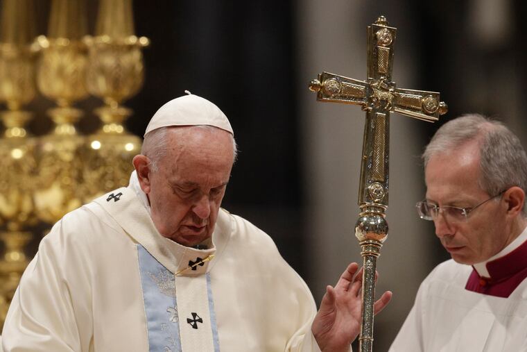Pope Francis presides over a Mass for the solemnity of St. Mary at the beginning of the new year, in St. Peter's Basilica at the Vatican, Wednesday, Jan. 1, 2020.