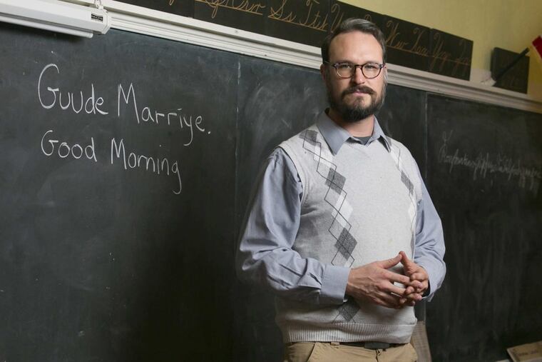 Patrick Donmoyer, building conservator and exhibit specialist, sits in the schoolroom at the Pennsylvania German Cultural Heritage Center, at Kutztown University, in Kutztown, Pa., on Nov. 28, 2017. Donmoyer, whose family moved to Lebanon County from Philadelphia in 1732, said that approximately 400,000 people speak Pennsylvania Dutch in the United States.
