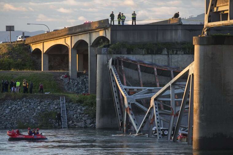 A portion of the Interstate 5 bridge sits in the Skagit River after it collapsed Thursday. Washington Gov. Jay Inslee said it would cost $15 million to repair the bridge, part of a major corridor in his state.