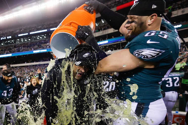 Lane Johnson celebrates the Eagles' 2022 NFC Championship with Nick Sirianni.
