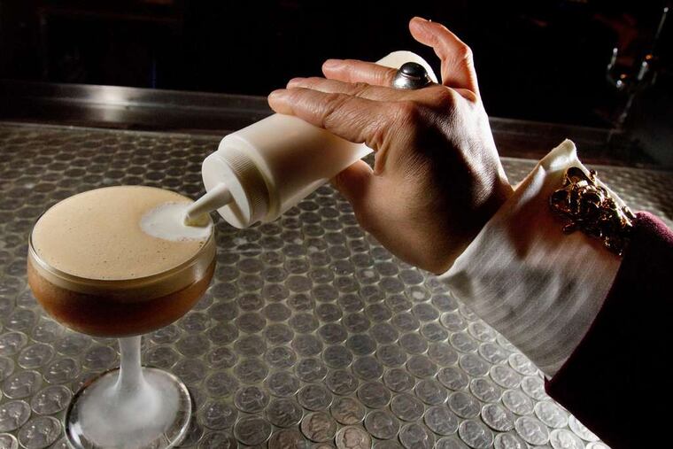 The "Nevermore" from Hop Sing Laundromat, which has Summertide Expression gin, Patron Citronge, Vietnamese coffee, and cream.