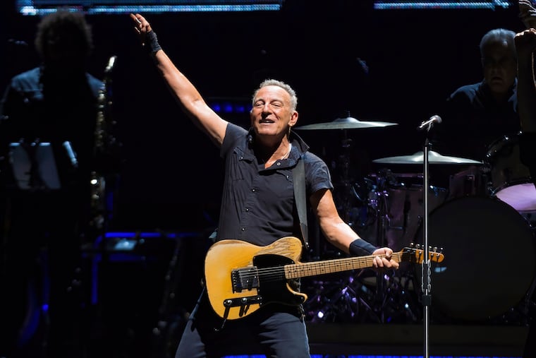 Bruce Springsteen and The E Street Band perform on tour at MetLife Stadium on Wednesday, Aug. 30, in East Rutherford, N.J. Springsteen canceled his tour dates for September to treat peptic ulcer disease, he announced Thursday.