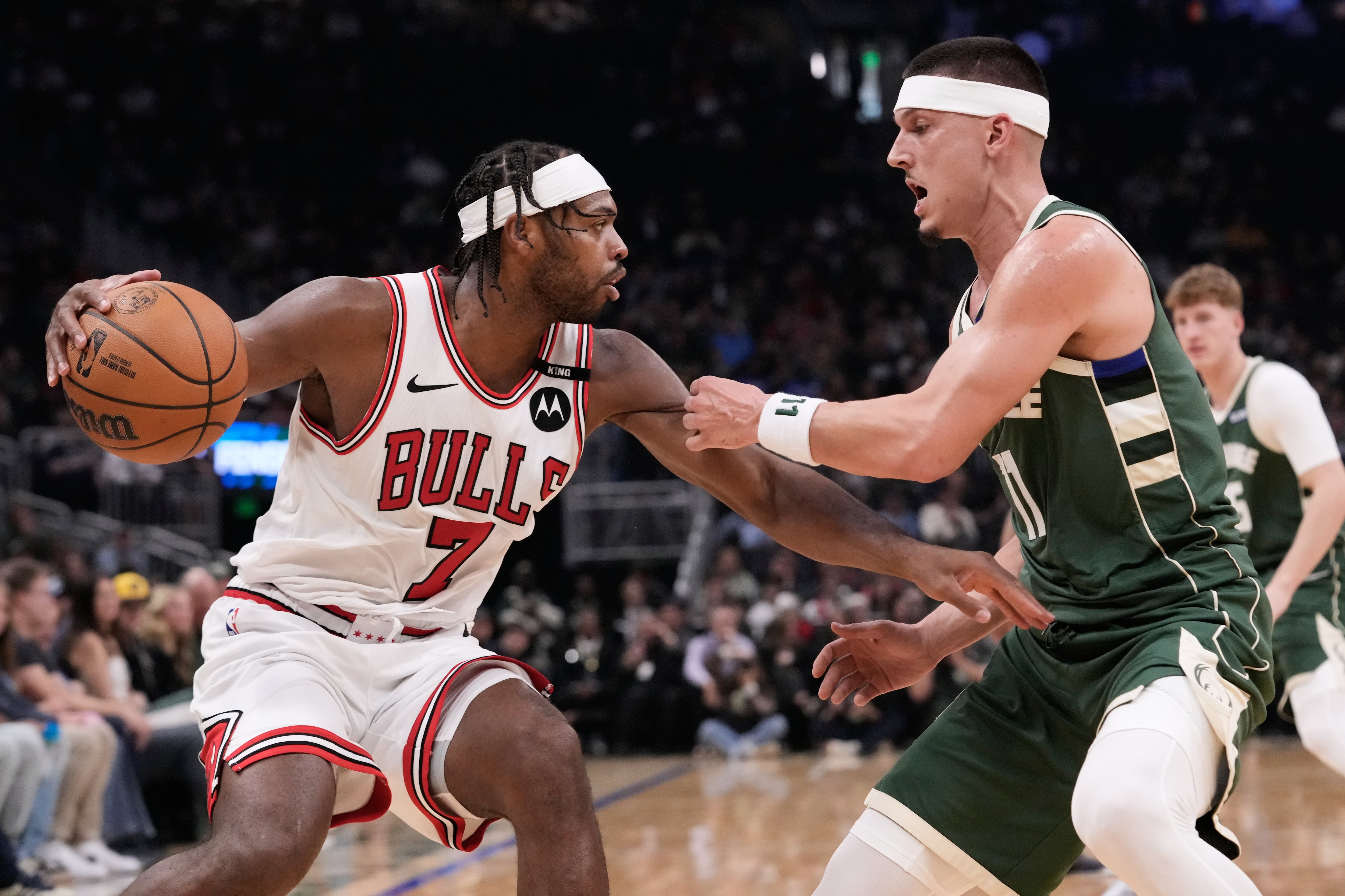 Powell scores 25 points to help the Bulls hold off the Bucks, 132-125