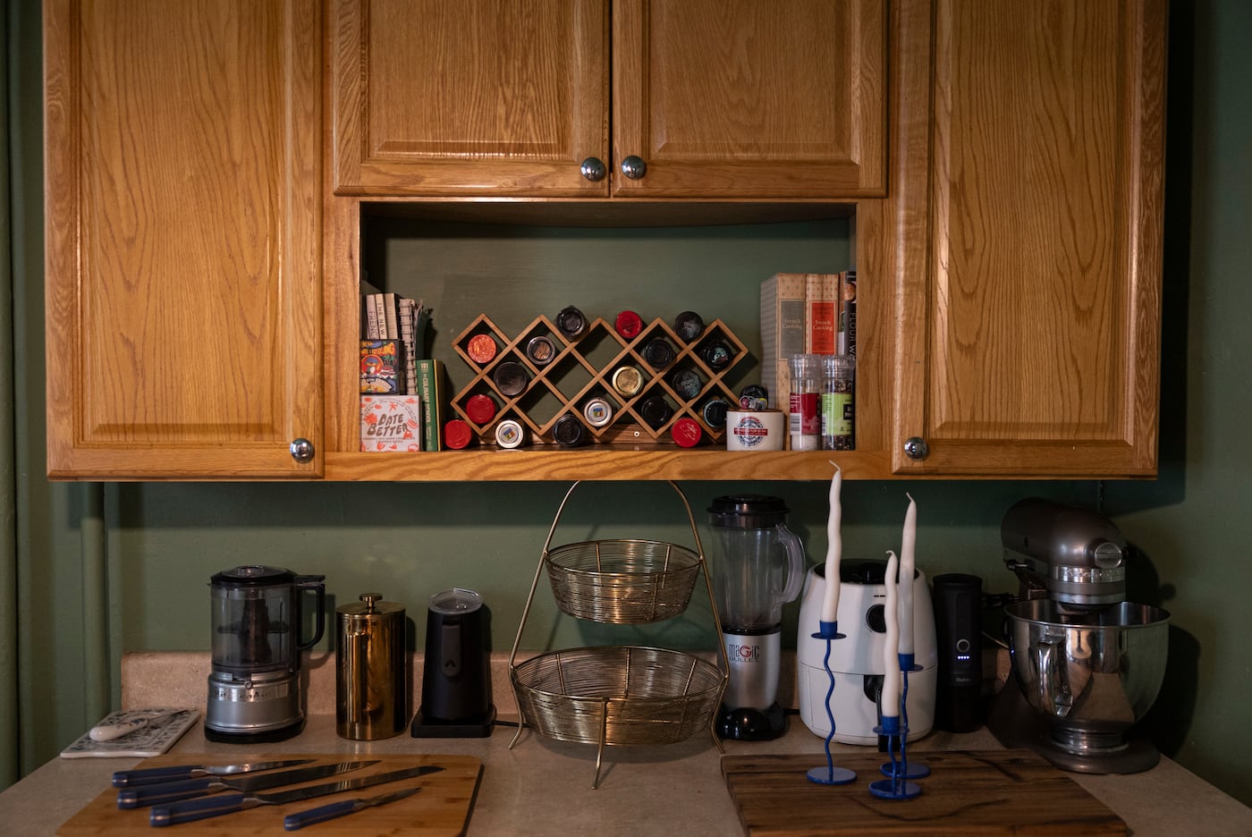 Huston maximized her small space by using a microwave nook as a spice rack.
