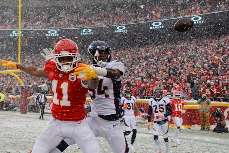 New Eagles safety Will Parks (34) defends Chiefs wide receiver Demarcus Robinson (11) in a game last season when he was playing for Denver.