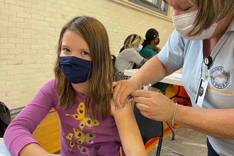 The author's daughter got her first dose of the COVID-19 vaccine on the first day the city began offering the vaccine to kids aged 5-11.