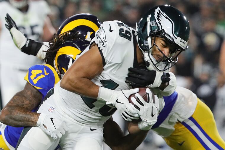 Golden Tate tries to get past Rams defensive back Marqui Christian on Sunday.