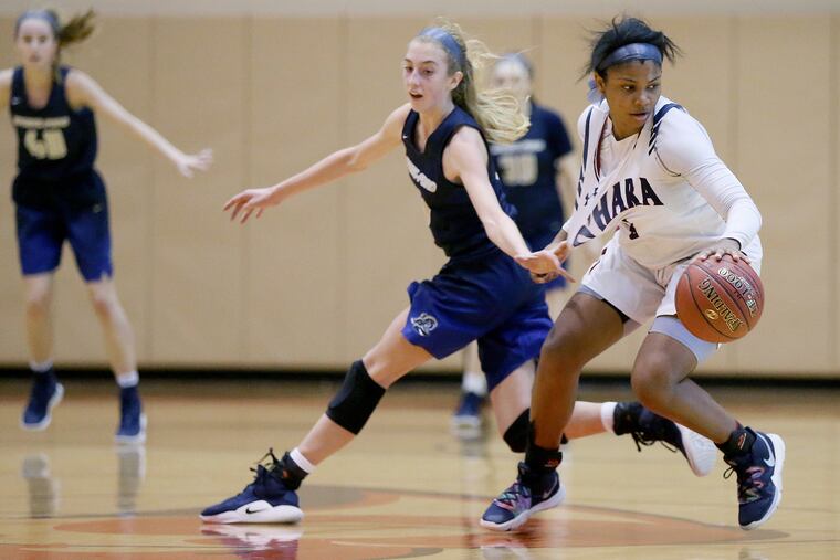 Spring-Ford's Lucy Olsen (left) defends against Cardinal O'Hara's Amaris Baker in a 2019 district playoff game.
