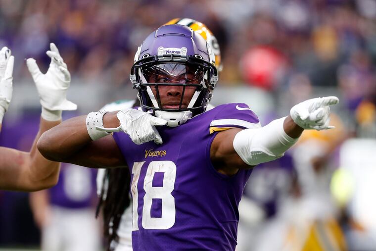 Minnesota Vikings wide receiver Justin Jefferson (18) celebrates after catching a pass against the Green Bay Packers, Sunday, Sept. 11, 2022.