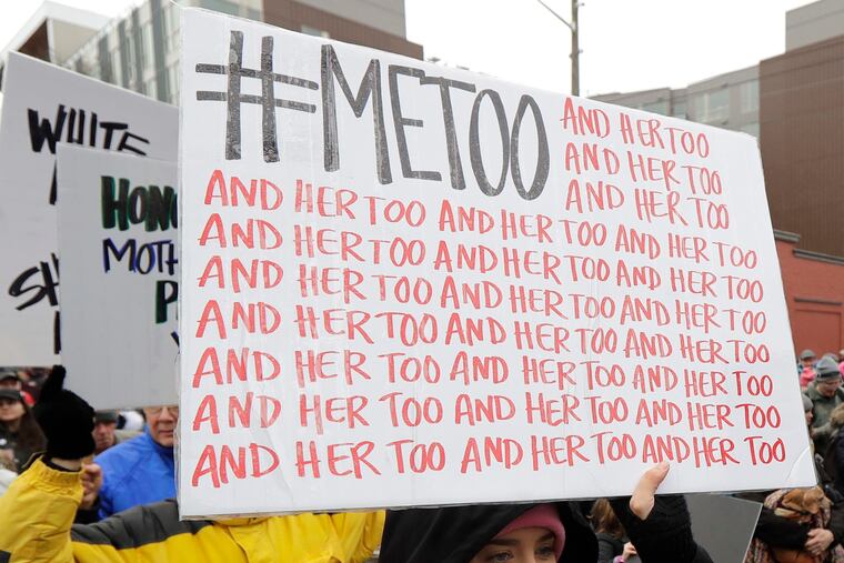 A marcher carries a sign with the popular Twitter hashtag #MeToo during the Women's March in Seattle in January 2018.