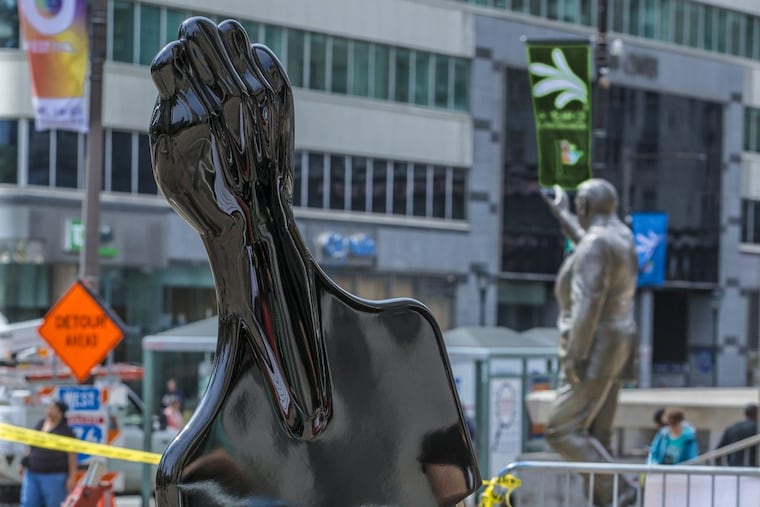 The new piece of art work on Thomas Paine Plaza, “ All Power to the People” by Hank Willis Thomas, near from the Frank Rizzo statue outside the Municipal Services Building.
