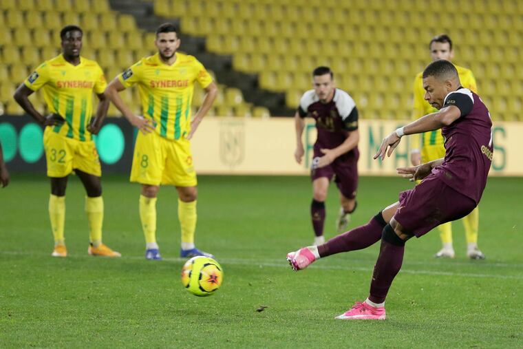 Kylian Mbappe, right, will lead Paris Saint-Germain against RB Leipzig in the UEFA Champions League on Wednesday.