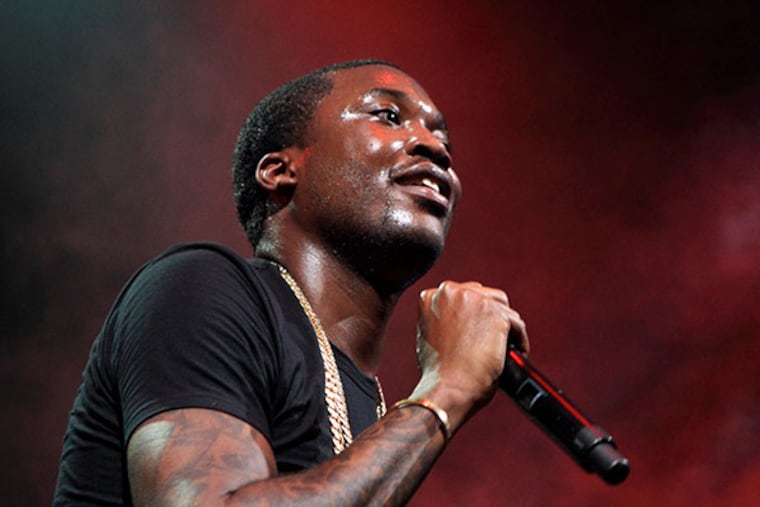 Meek Mill performs during the Power 99 Powerhouse 2013 concert at the Wells Fargo Center on Friday, October 25, 2013, in Philadelphia. (Photo by Owen Sweeney/Invision/AP)