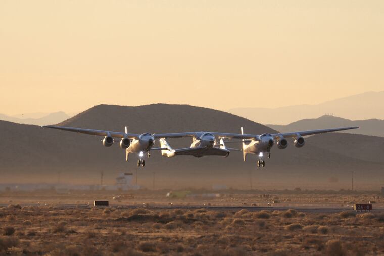 FILE - The VSS Unity/VMS Eve take to the skies for Virgin Galactic's first spaceflight. (Virgin Galactic/TNS)