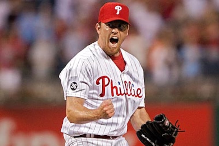Brad Lidge pitched a perfect inning in Sunday's game. (David M Warren/Staff file photo)