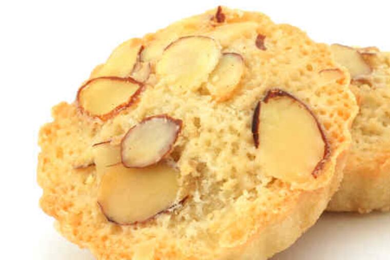 Financiers are elegant little cakes, created by a French baker in the financial district of Paris in the 1890's. He named them for wealthy bankers who favored these sweet almond cakes because they could be enjoyed without utensils or risking damage to one's suit, shirt or tie.