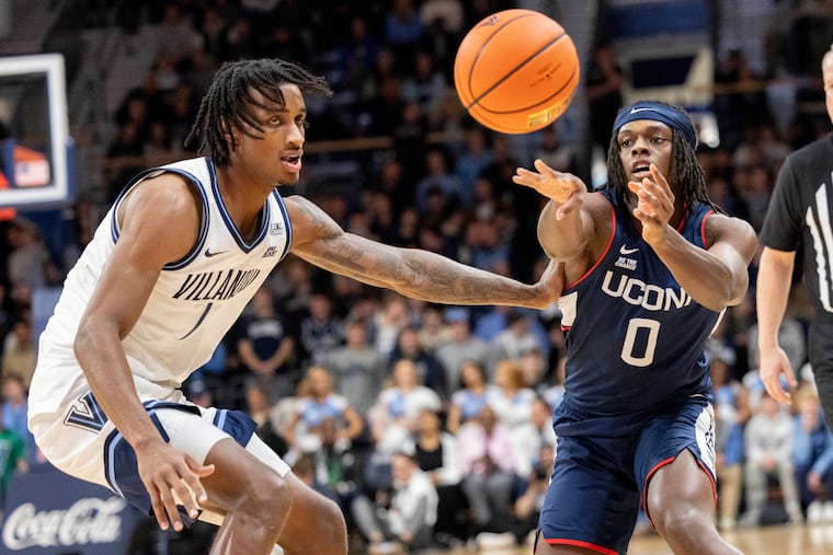 UConn's Ahmad Nowell (right) averaged 1.5 points in 6.4 minutes as a freshman.