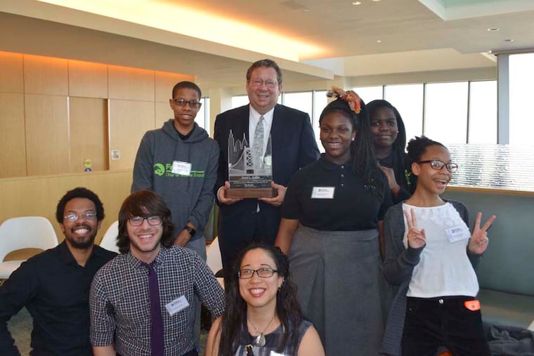 Freire students and staff surround David Cohen, recipient of the Bridge to Wisdom award.
MAGGIE HENRY CORCORAN