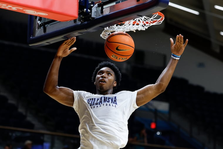 Villanova guard Malachi Palmer dunks the basketball at the Finneran Pavilion on July 28.