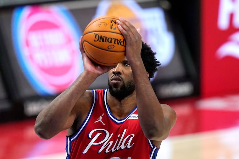 Sixers center Joel Embiid shoots during the second half of Saturday's against the Detroit Pistons.