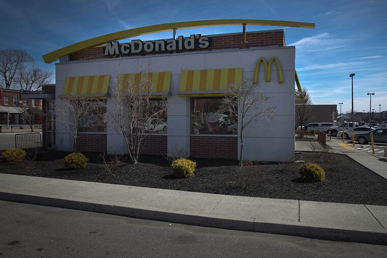 The McDonald’s franchise at 52d and Columbia in West Philadelphia put portable toilets in the parking lot after the toilets backed up. It continued serving food for four days. (ALEJANDRO A. ALVAREZ / Staff Photographer)