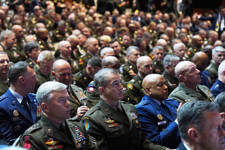 U.S. military senior leadership are seen before President Donald Trump arrives to speaks at Marine Corps Base Quantico on Tuesday.