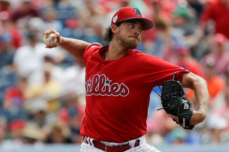 Phillies pitcher Aaron Nola throws against the Houston Astros during a spring training game on Saturday, March 16, in Clearwater, Fla.