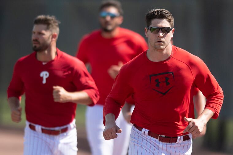 Jerad Eickhoff runs during spring-training workouts in Clearwater on Sunday.