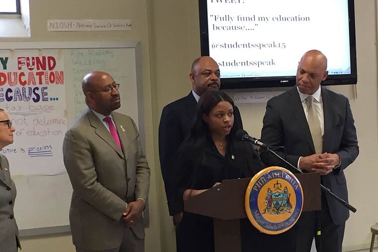 Sasheika Duffus, a junior, speaks in front of Mayor Nutter, Jerry Jordan and William Hite during the "Students Speak!" campaign launch. (SOLOMON LEACH / DAILY NEWS STAFF)