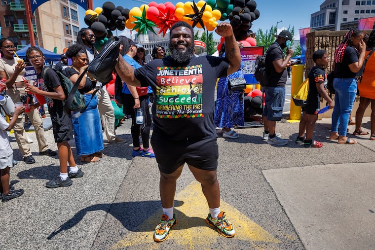 Ken Carter of Philadelphia sports his Juneteenth t-shirt during the Juneteenth Block Party celebration held outside the African American Museum in Philadelphia, Thursday, June 19, 2025.
