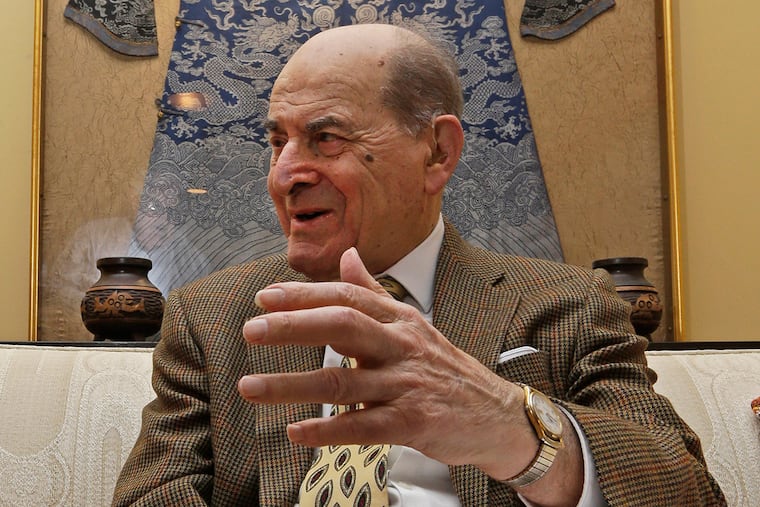 Dr. Henry Heimlich, seen here at his home in 2014, is known for developing the Heimlich maneuver that has been used to clear obstructions from the windpipes of choking victims around the world for four decades.