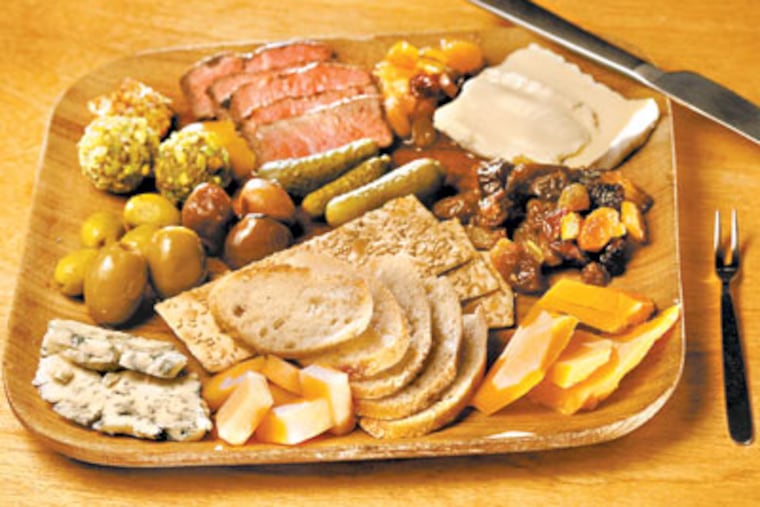 The Farmer's Plate at Sycamore: a choice of three cheeses and two charcuterie items, plus accoutrements. ( Michael S. Wirtz / Staff Photographer )
