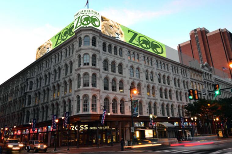 Rendering shows what towering video billboards/signs will look like atop the Lit Brothers building between 7th and 8th streets on the north side of Market Street. Image supplied by A2aMEDIA