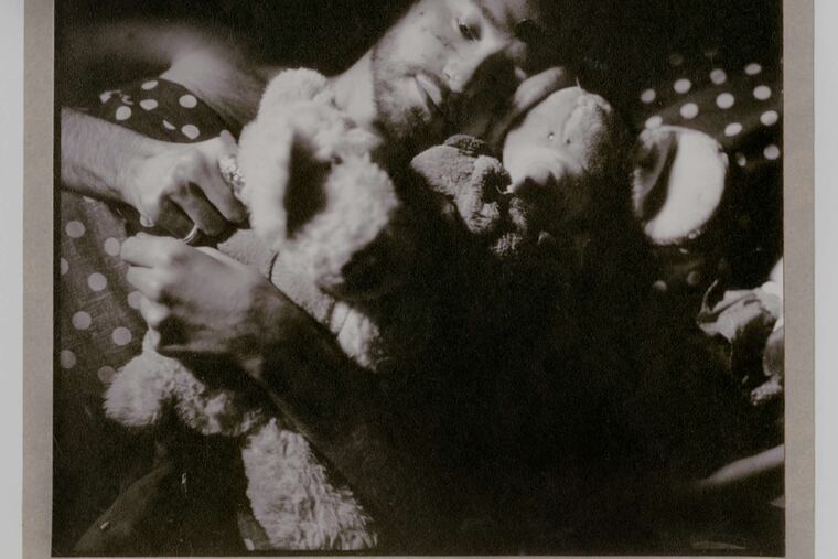 Bruce Cratsley's photograph "David in Bed with his 'Animal Friends,' " an undated gelatin silver print, is part of the "Bruce Cratsley: Shifting Identities" exhibition at Swarthmore College's List Gallery. Cratsley graduated from Swarthmore in 1966.