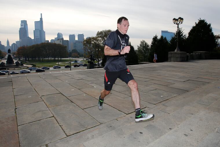 Mark Gibson running up the steps at the Philadelphia Museum of Art on Friday.