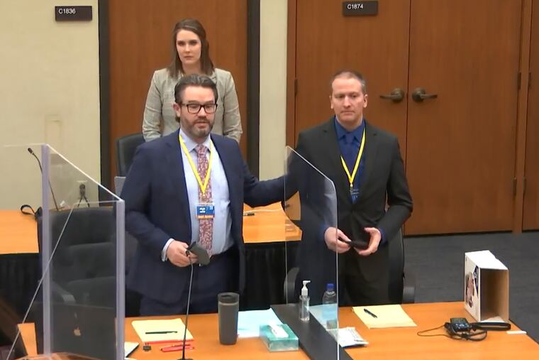 FILE - In this image taken from video, defense attorney Eric Nelson, left, defendant and former Minneapolis police officer Derek Chauvin, right, and Nelson's assistant Amy Voss, back, introduce themselves to potential jurors on Tuesday, March 23, 2021, as Hennepin County Judge Peter Cahill presides over jury selection in the trial of Chauvin at the Hennepin County Courthouse in Minneapolis. Chauvin is charged in the May 25, 2020 death of George Floyd. The huge task for jurors at the trial of Chauvin showed during jury selection as some would-be jurors said they were unnerved by the very thought of being on the panel.