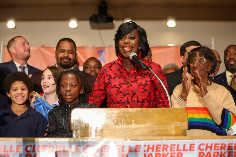 Cherelle L. Parker speaks at her election night party at the Sheet Metal Workers Local 19, on Tuesday, Nov. 7, 2023, in Philadelphia. Second from left is State Sen. Sharif Street.