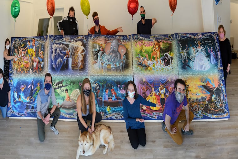 Eureka! Puzzles put its 4,320 piece Disney puzzle on display at a gallery after everyone completed separate sections. MUST CREDIT: David Leschinsky.